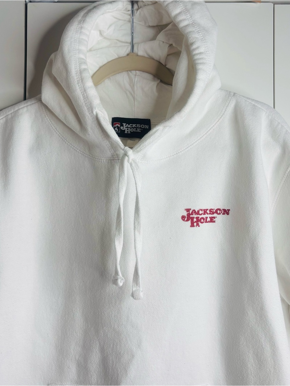 Jackson Hole White Hoodie with Pink Chest Logo